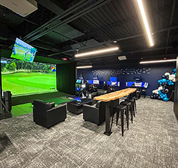 A golf simulator play room.